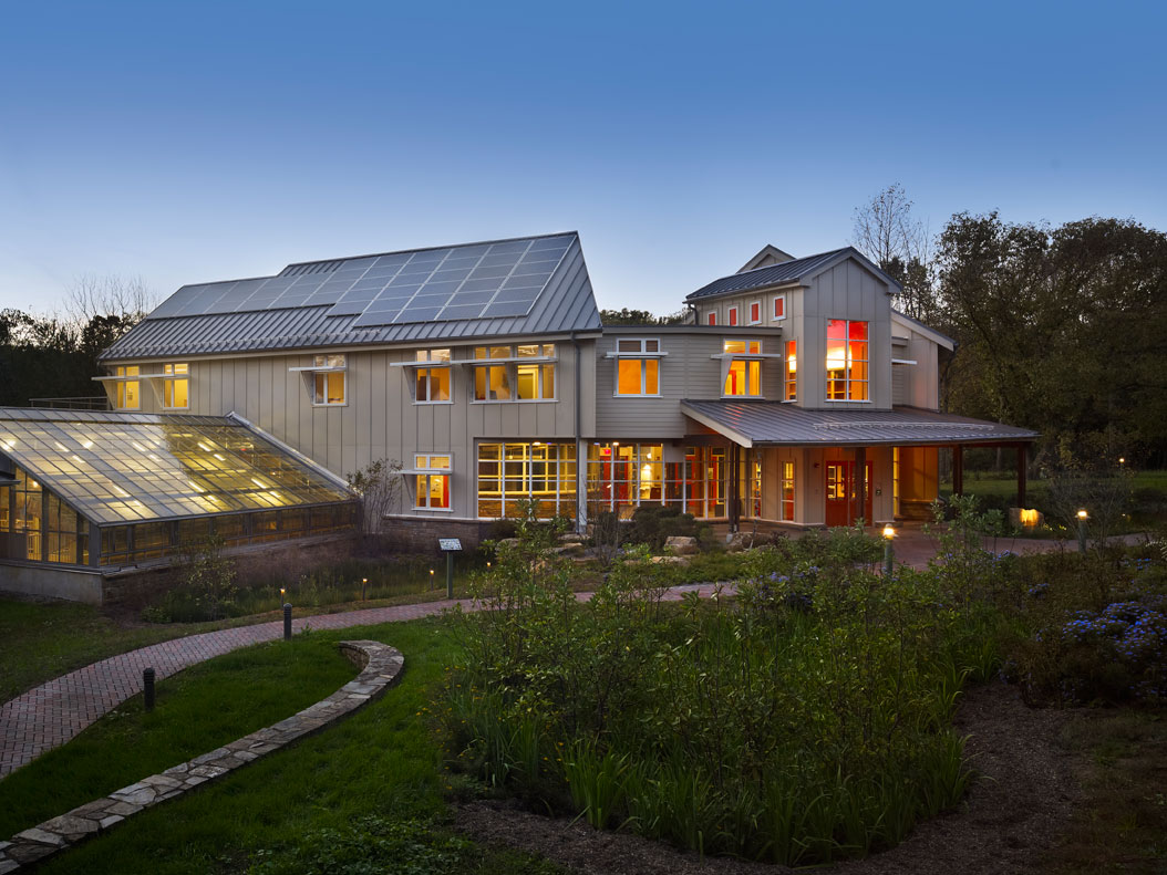 The exterior of the Moorhead Environmental Complex at dusk.