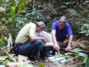 Bern Sweeney and Jamie Blaine sampling a stream in Peru.