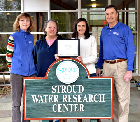 Stroud Water Research Center educators proudly display their Outstanding Environmental Education Program Award.