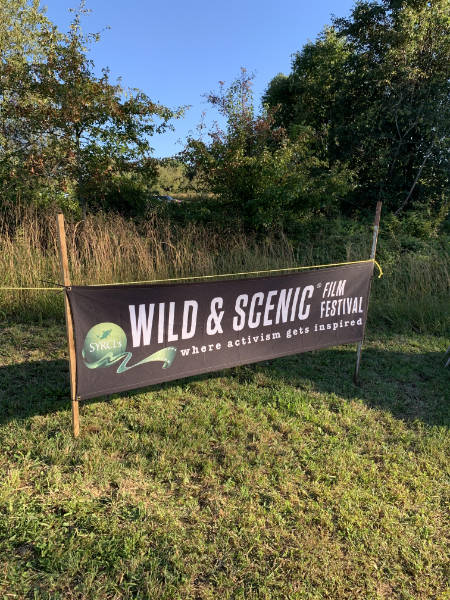 A banner announcing the 2021 outdoor version of the Wild & Scenic Film Festival.