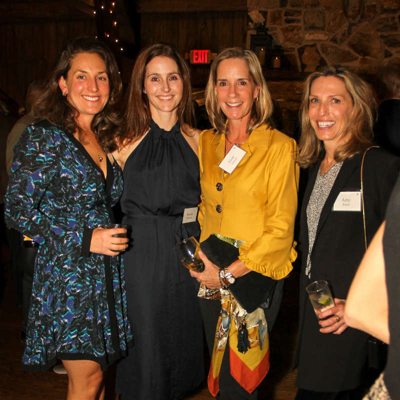 Four women in fancy dress at the 2021 Water's Edge gala.