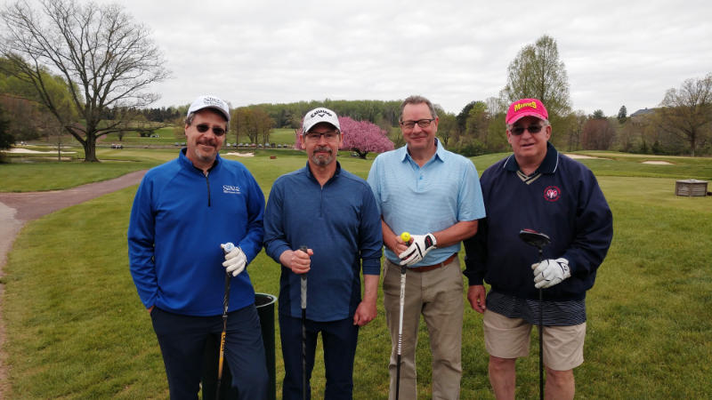 Dave Arscott and three other golfers at the 2022 Fore Fresh Water golf outing.