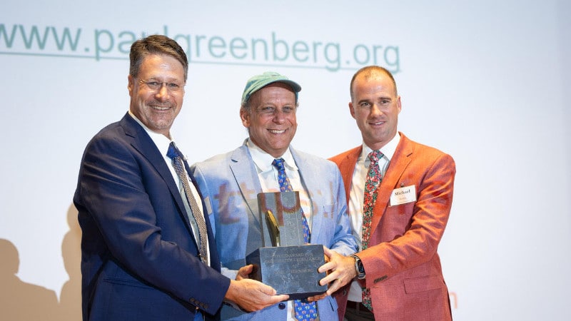 David Arscott and Michael Bucklin present the Stroud Award for Freshwater Excellence to Paul Greenberg.