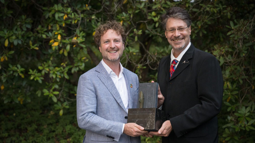 Paul O'Callaghan accepts the 2025 Stroud Award for Freshwater Excellence from Executive Director David Arscott.