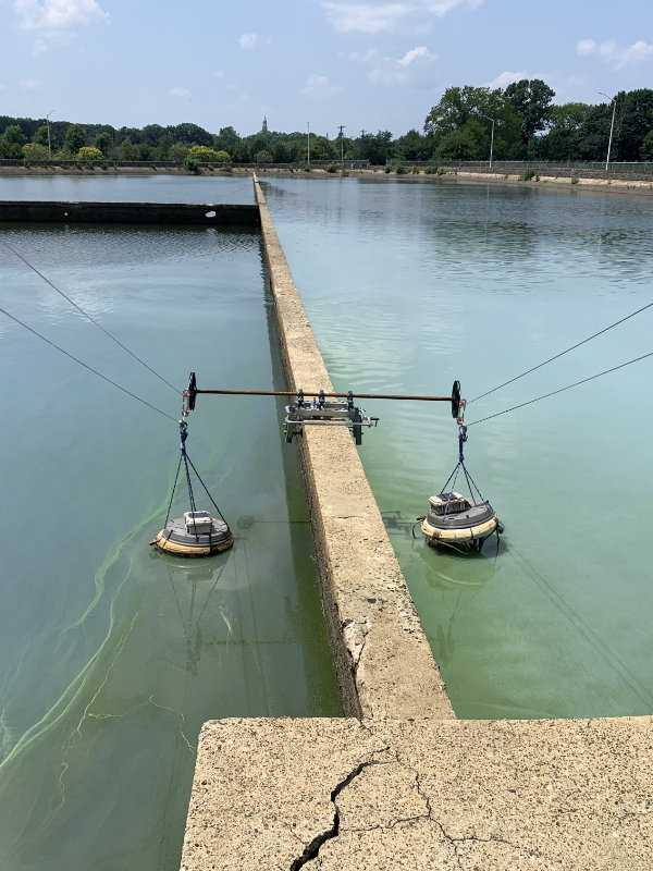 Floating monitoring stations deployed in a Wilmington, Delaware drinking water reservoir to monitor algal growth.
