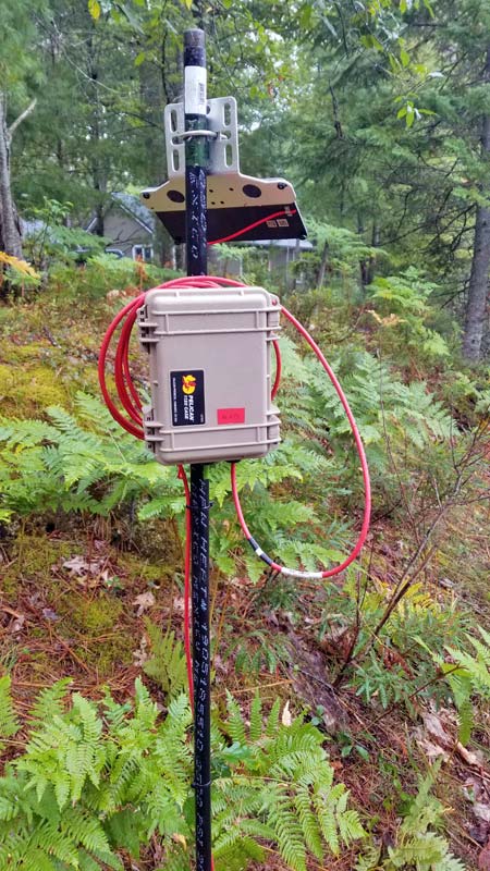 Photo of an EnviroDIY Monitoring Station on the Manistee River, Michigan.