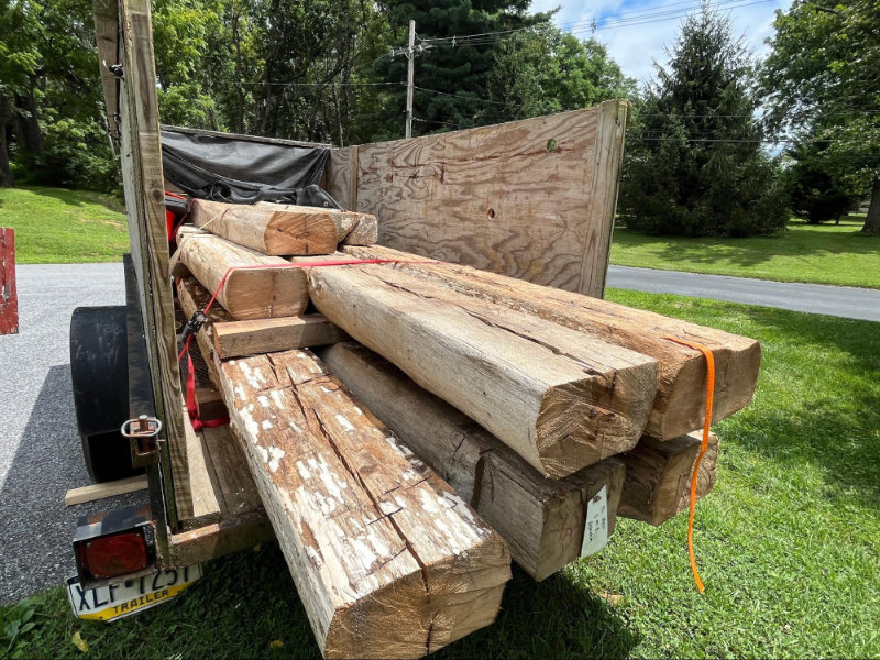 New logs being delivered for the historic cabin,