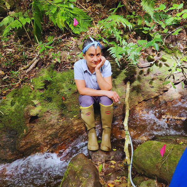Diana Oviedo Vargas monitors the release of nitrogen into the stream.
