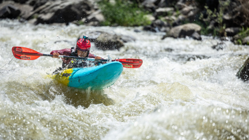 Whitewater kayaking still from the film Paddle Tribal Waters.