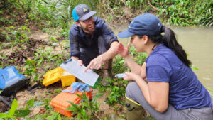 Marc Peipoch and Diana Oviedo Vargas sampling a tropical stream.