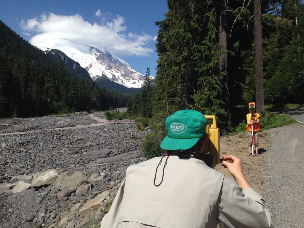 Joseph George surveying in Mount Rainier National Park