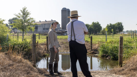 Heather Titanich, watershed restoration coordinator at the Stroud Center, meets with farmer David Smucker to discuss tree plantings.