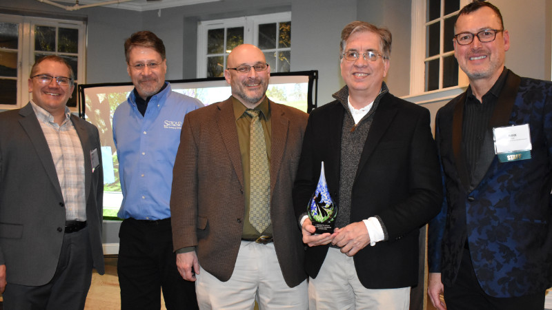 Stroud Center Executive Director David B. Arscott along with Director of Watershed Restoration Matthew Ehrhart and Senior Research Scientist Jackson, Ph.D., accept the Watershed Champion award.