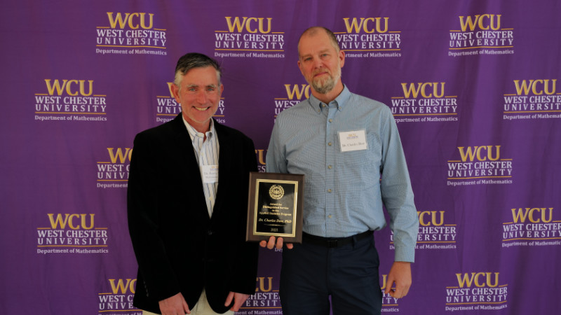 Charles Dow, Ph.D. receives the Distinguished Service Award from West Chester University’s Department of Mathematics.