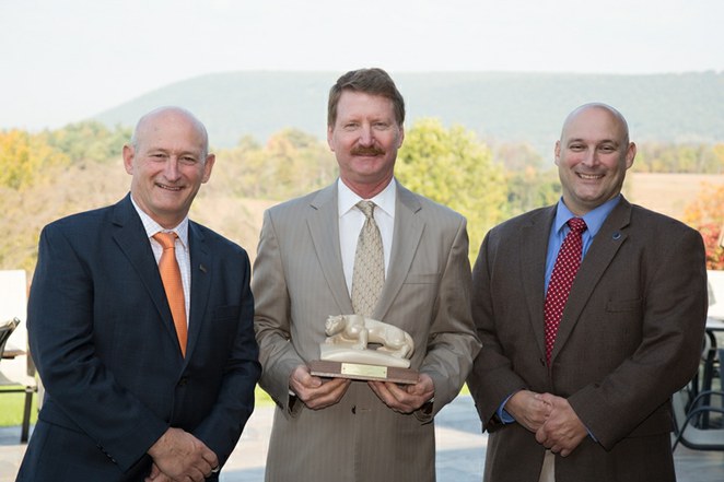 Matt Ehrhart with Penn State’s Dean of College of Agriculture Richard Roush and Sen. Elder Vogel Jr.