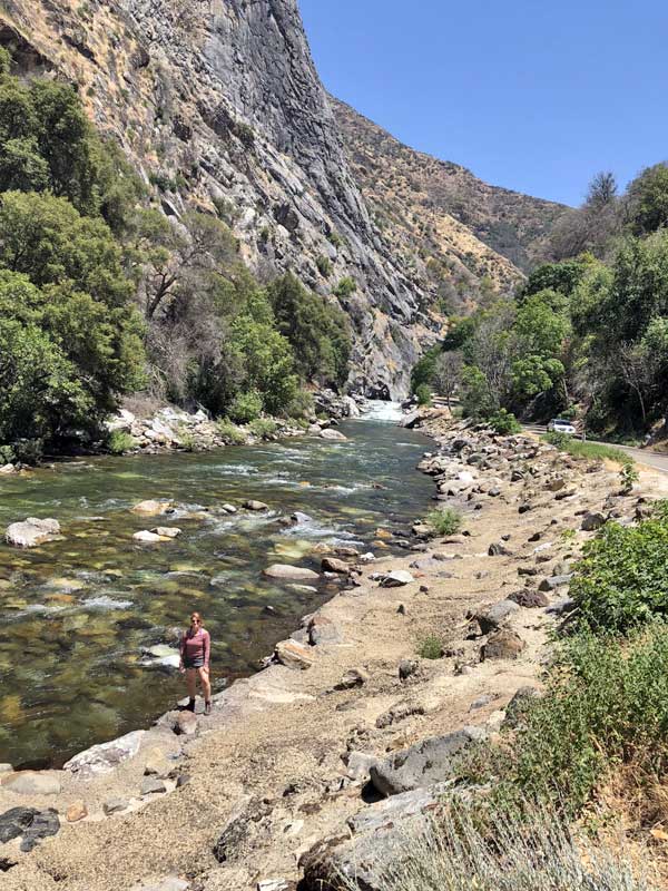 Katie Billé standing next to Kings River in Kings Canyon, California.