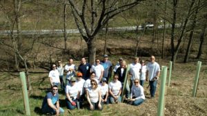 Dansko volunteers pose for a group photo at a tree planting event.