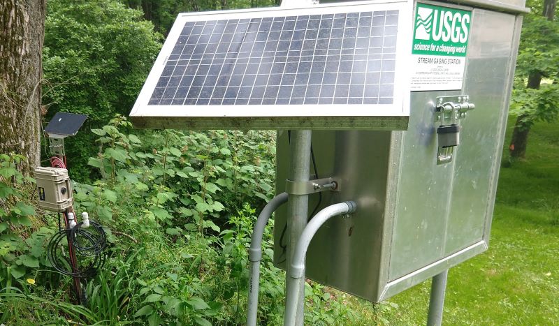 An EnviroDIY monitoring station next to a USGS gaging station on White Clay Creek near Avondale.