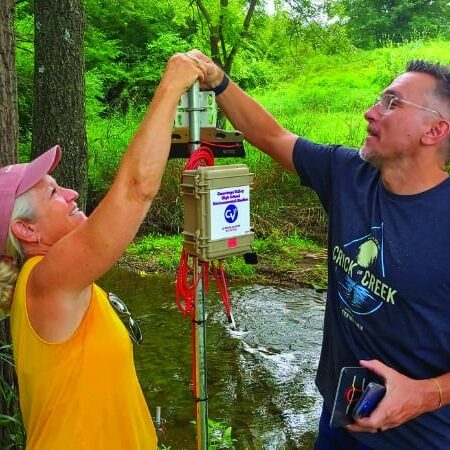 High school science teachers install an EnviroDIY Monitoring Station near a stream in Lancaster County, Pennsylvania.