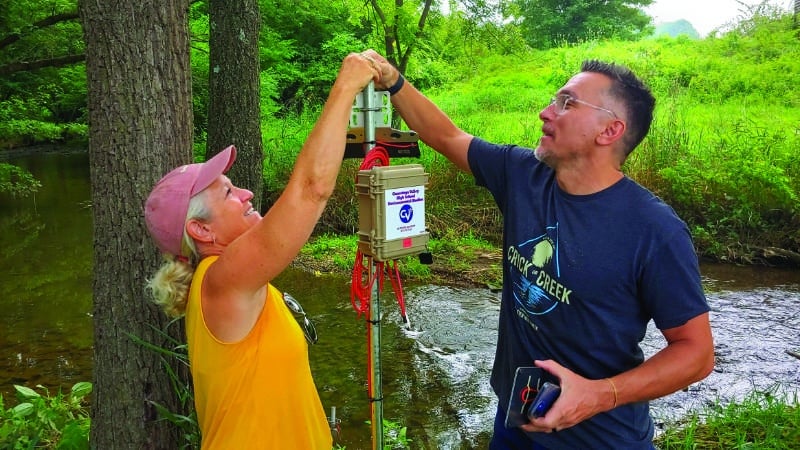 High school science teachers install an EnviroDIY Monitoring Station near a stream in Lancaster County, Pennsylvania.