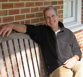 Jamie Blaine sits on a bench at the Stroud Center.