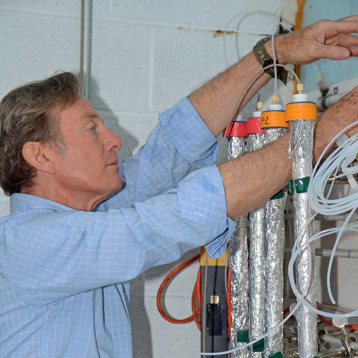 Louis Kaplan working with streamwater bioreactors.