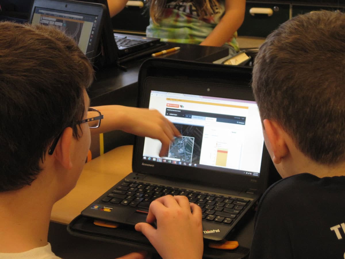 Students using the Model My Watershed web app on a laptop computer.