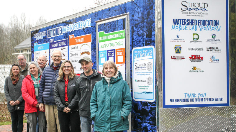 Representatives of funding agencies with the Watershed Education Mobile Lab funders.