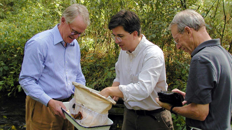 Rod Moorhead III, John Jackson, and John R.S. Fisher examine macroinvertebrates collected in White Clay Creek.