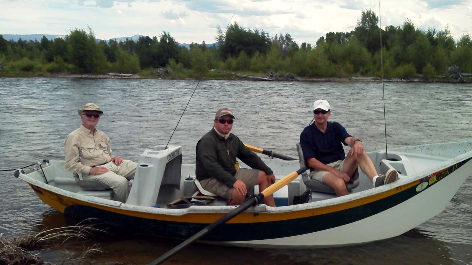 Rod Moorhead and Bern Sweeney fishing on a river.