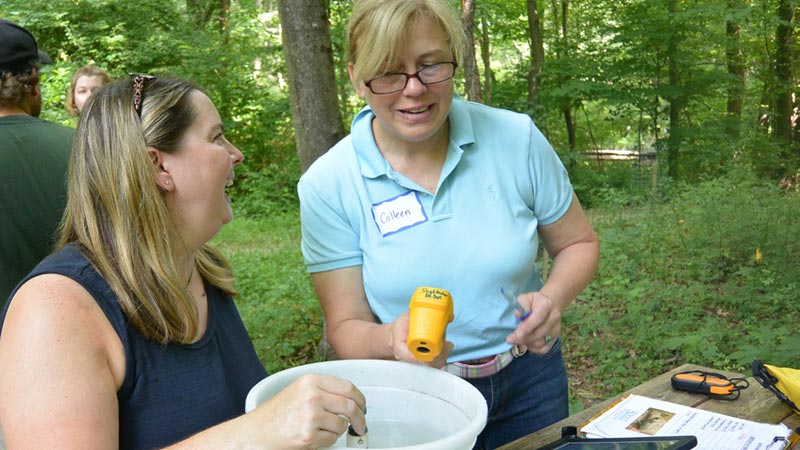 Two teachers enjoying a workshop.