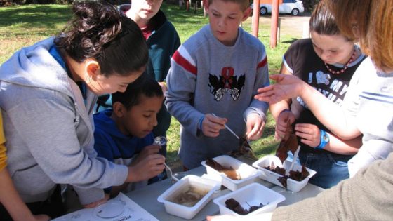 Students in Oregon performing a leaf pack experiment.
