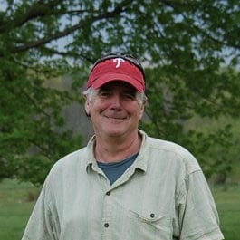 Peter Welling wearing a Phillies baseball cap.