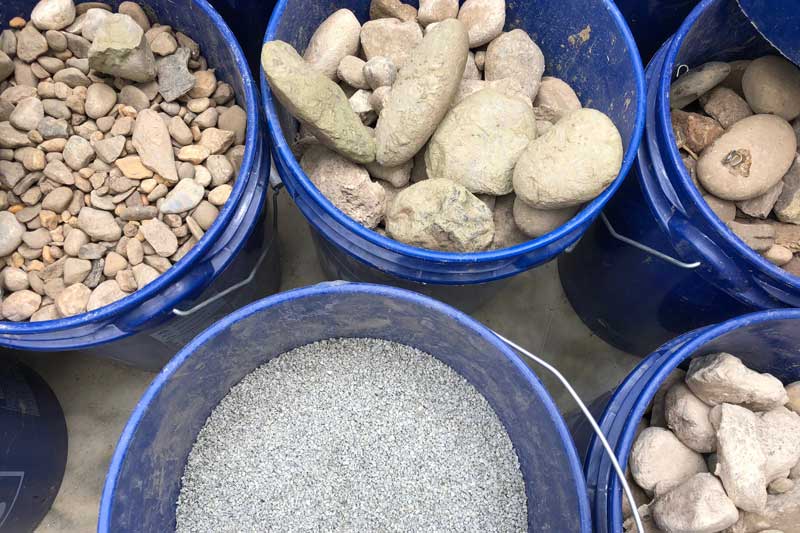 Buckets of sterilized rocks for the biofilm experiment