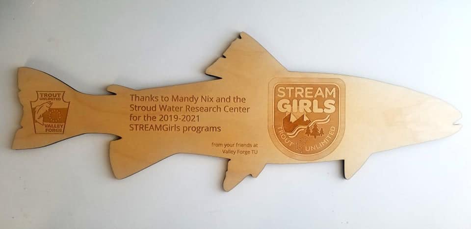 Trout-shaped wooden plaque awarded to Mandy Nix by Valley Forge Trout Unlimited.