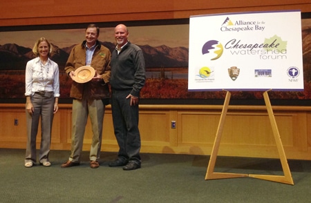 Photo of Bern Sweeney receiving the Forest Champion Award
