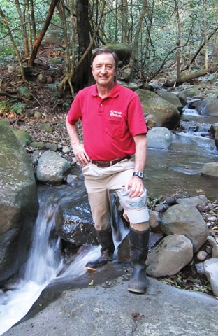 Photo of Bern Sweeney standing in a stream